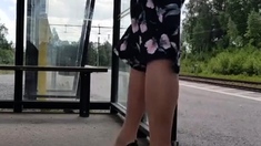 HannaTransa Chastity Crossdresser outdoors at train station.