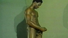 Athletic black stud exposes his fabulous body and strokes his big dick